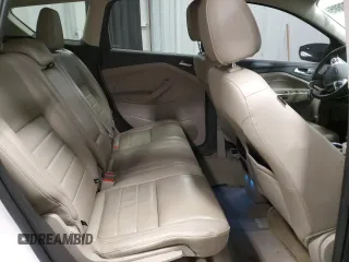 2014 Ford Escape Titanium with VIN 1FMCU9JX1EUD40870, listed as a Copart auction lot 51337695 with 163,210 mi miles and Salvage Title. Bid and sale history available at DreamBid. Image 11.