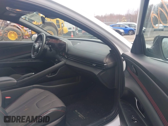2023 Hyundai Elantra N Line z VIN KMHLR4AFXPU431201, wystawiony jako IAAI lot #41958900 z przebiegiem 38 539 mil mil oraz . Historia ofert i sprzedaży dostępna na DreamBid. Obrazek 5.