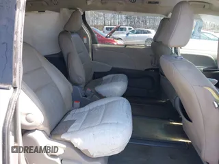 2017 Toyota Sienna with VIN 5TDDZ3DC9HS164773, listed as a IAAI auction lot 41811899 with 100,301 mi miles and . Bid and sale history available at DreamBid. Image 8.