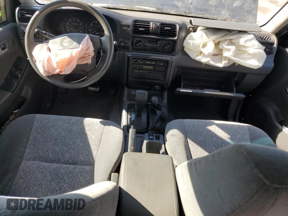 2001 Isuzu Rodeo S with VIN 4S2DM58W914301991, listed as a Copart auction lot 76518844 with 165,789 mi miles and Salvage Title. Bid and sale history available at DreamBid. Image 8.