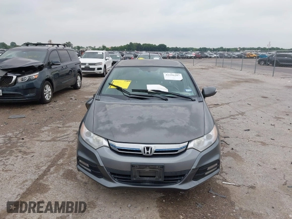 2012 Honda Insight EX with VIN JHMZE2H79CS004299, listed as a IAAI auction lot 42296207 with 170,288 mi miles and . Bid and sale history available at DreamBid. Image 12.