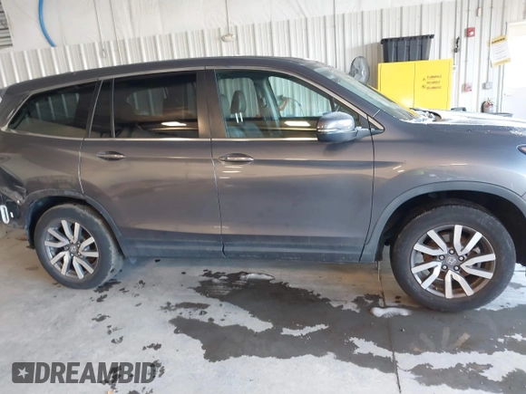2021 Honda Pilot EX-L with VIN 5FNYF6H56MB037761, listed as a IAAI auction lot 41154468 with 61,159 mi miles. Bid and sale history available at carsss.com. Image 13.