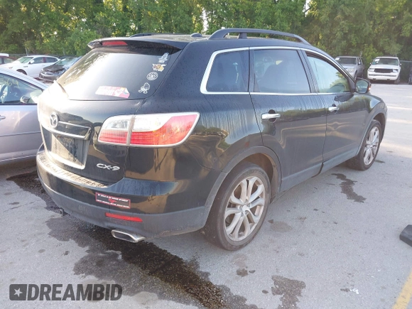 2012 Mazda CX-9 Grand Touring z VIN JM3TB2DA7C0333345, wystawiony jako IAAI lot #42224023 z przebiegiem 177 289 mil mil oraz . Historia ofert i sprzedaży dostępna na DreamBid. Obrazek 4.