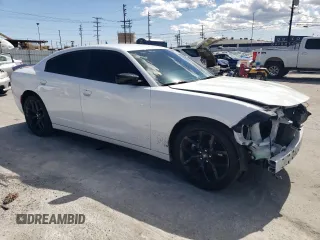 2022 Dodge Charger SXT with VIN 2C3CDXBG4NH161771, listed as a Copart auction lot 51740605 with 28,930 mi miles and Salvage Title. Bid and sale history available at DreamBid. Image 4.