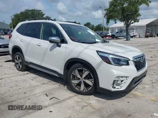 2021 Subaru Forester Touring with VIN JF2SKAXC8MH574427, listed as a IAAI auction lot 42529701 with 11,409 mi miles and . Bid and sale history available at DreamBid. Image 1.