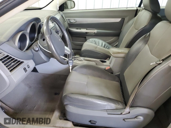 2008 Chrysler Sebring Touring z VIN 1C3LC55R08N271099, wystawiony jako Copart lot #53620705 z przebiegiem 134 637 mil mil oraz Szkoda całkowita • Salvage title. Historia ofert i sprzedaży dostępna na DreamBid. Obrazek 7.