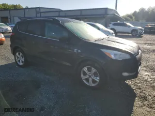 2015 Ford Escape SE with VIN 1FMCU9GX0FUB56304, listed as a Copart auction lot 52232325 with 115,131 mi miles and Salvage Title. Bid and sale history available at carsss.com. Image 4.