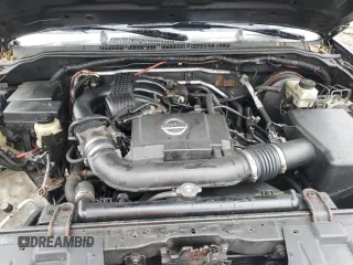 2005 Nissan Frontier LE z VIN 1N6AD07W05C445604, wystawiony jako Copart lot #60499225 z przebiegiem 206 803 mil mil oraz Czysty tytuł • Clean title. Historia ofert i sprzedaży dostępna na DreamBid. Obrazek 11.
