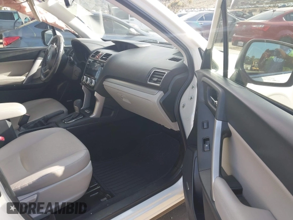 2016 Subaru Forester Touring with VIN JF2SJAXC7GH565287, listed as a IAAI auction lot 41947083 with 126,563 mi miles and . Bid and sale history available at DreamBid. Image 5.
