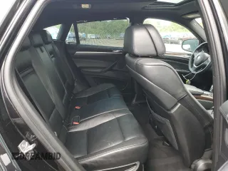 2012 BMW X6 50i z VIN 5UXFG8C51CLZ97393, wystawiony jako Copart lot #58407285 z przebiegiem 128 040 mil mil oraz Szkoda całkowita • Salvage title. Historia ofert i sprzedaży dostępna na DreamBid. Obrazek 11.