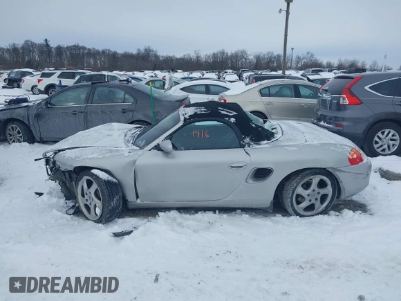 2000 Porsche Boxster z VIN WP0CA2984YU621650, wystawiony jako IAAI lot #41381416 z przebiegiem 71 514 mil mil oraz . Historia ofert i sprzedaży dostępna na DreamBid. Obrazek 14.
