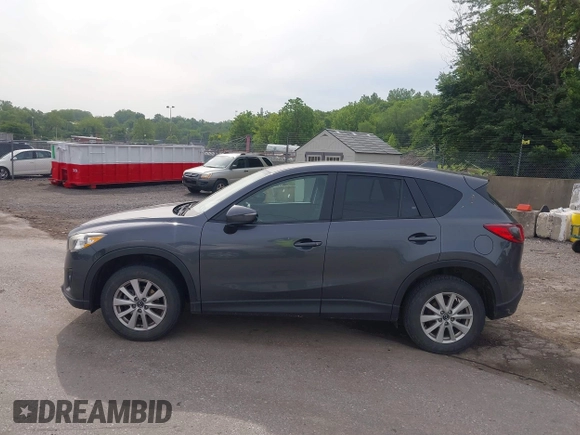 2014 Mazda CX-5 Touring z VIN JM3KE4CY2E0348500, wystawiony jako IAAI lot #42318155 z przebiegiem 182 616 mil mil oraz . Historia ofert i sprzedaży dostępna na DreamBid. Obrazek 14.