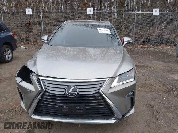 2019 Lexus RX with VIN 2T2BZMCA0KC184967, listed as a IAAI auction lot 41614592 with 35,860 mi miles. Bid and sale history available at carsss.com. Image 12.