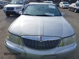 2002 Lincoln Continental with VIN 1LNHM97V92Y606541, listed as a IAAI auction lot 41719348 with 235,967 mi miles and . Bid and sale history available at DreamBid. Image 6.