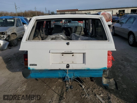 1994 Jeep Cherokee Sport with VIN 1J4FT68S0RL142185, listed as a Copart auction lot 80419344 with 172,294 mi miles and Salvage Title. Bid and sale history available at carsss.com. Image 6.
