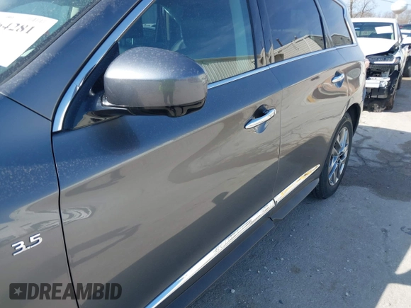 2015 Infiniti QX60 with VIN 5N1AL0MM4FC536249, listed as a IAAI auction lot 41964281 with 148,851 mi miles and . Bid and sale history available at DreamBid. Image 12.
