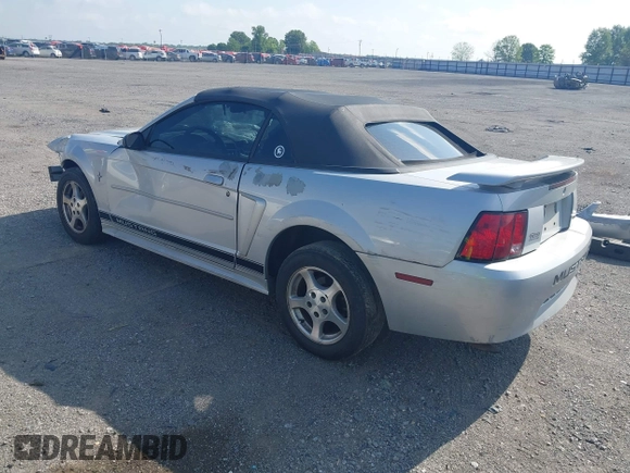 2002 Ford Mustang Deluxe with VIN 1FAFP44432F205991, listed as a IAAI auction lot 42144709 with 138,119 mi miles and . Bid and sale history available at DreamBid. Image 3.