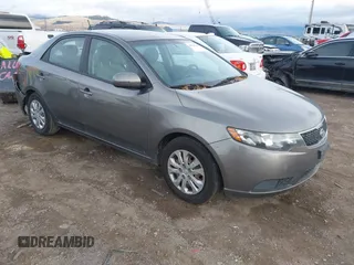 2011 Kia Forte EX with VIN KNAFU4A21B5458641, listed as a IAAI auction lot 40834309 with 149,137 mi miles. Bid and sale history available at carsss.com. Image 1.