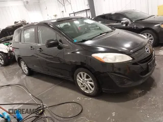2012 Mazda 5 Sport z VIN JM1CW2BL8C0101631, wystawiony jako IAAI lot #41803784 z przebiegiem 153 595 mil mil oraz . Historia ofert i sprzedaży dostępna na DreamBid. Obrazek 1.