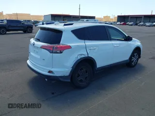 2017 Toyota RAV4 LE with VIN JTMZFREV2HJ721392, listed as a IAAI auction lot 41697170 with 59,357 mi miles and . Bid and sale history available at carsss.com. Image 4.