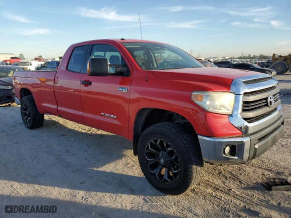 2014 Toyota Tundra 4WD Truck SR with VIN 5TFCY5F1XEX017048, listed as a Copart auction lot 82190834 with 302,685 mi miles and Salvage Title. Bid and sale history available at carsss.com. Image 4.