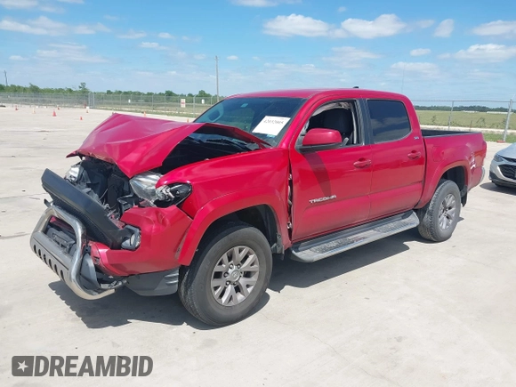 2016 Toyota Tacoma SR5 with VIN 5TFAX5GN2GX059826, listed as a IAAI auction lot 42032005 with 209,271 mi miles. Bid and sale history available at carsss.com. Image 2.