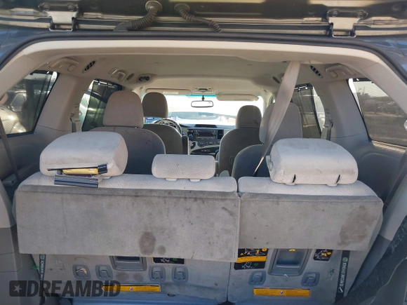 2012 Toyota Sienna LE with VIN 5TDJK3DCXCS039801, listed as a IAAI auction lot 41483248 with 165,548 mi miles. Bid and sale history available at carsss.com. Image 8.