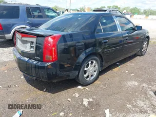 2004 Cadillac CTS with VIN 1G6DM577040128494, listed as a IAAI auction lot 42111727 with 102,142 mi miles. Bid and sale history available at carsss.com. Image 4.