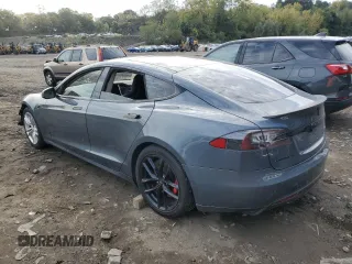 2014 Tesla Model S 60 with VIN 5YJSA1H14EFP28471, listed as a Copart auction lot 73715834 with 99,442 mi miles and Clean Title. Bid and sale history available at DreamBid. Image 2.