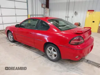 2003 Pontiac Grand Am GT with VIN 1G2NW12E23C319717, listed as a IAAI auction lot 41540987 with 195,850 mi miles. Bid and sale history available at carsss.com. Image 3.