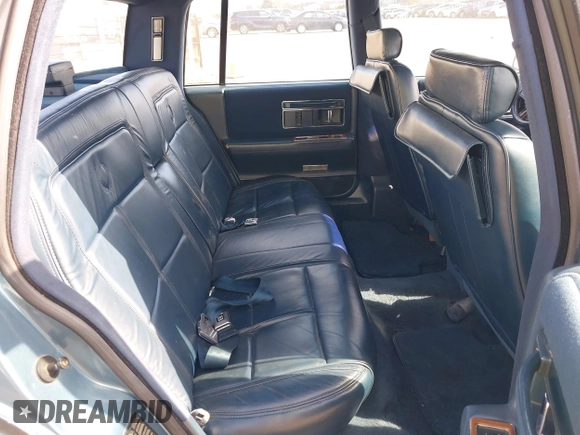 1986 Cadillac Seville z VIN 1G6KS6989GU813079, wystawiony jako IAAI lot #41732353 z przebiegiem Nie podano mil oraz . Historia ofert i sprzedaży dostępna na DreamBid. Obrazek 8.
