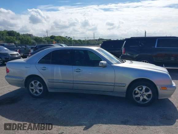 2002 Mercedes-Benz E-Class with VIN WDBJF82J02X070968, listed as a IAAI auction lot 41352216 with 91,704 mi miles. Bid and sale history available at carsss.com. Image 13.