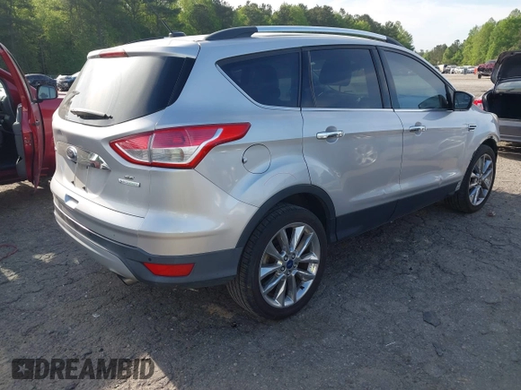 2016 Ford Escape SE with VIN 1FMCU0GX1GUB29903, listed as a IAAI auction lot 42066559 with 156,689 mi miles and . Bid and sale history available at carsss.com. Image 4.