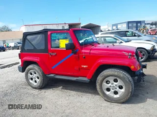 2014 Jeep Wrangler Sahara with VIN 1C4AJWBG0EL109773, listed as a IAAI auction lot 41678412 with 12,264 mi miles and . Bid and sale history available at DreamBid. Image 13.