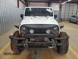 2012 Jeep Wrangler Unlimited Sport z VIN 1C4BJWDG4CL140250, wystawiony jako Copart lot #55174665 z przebiegiem 91 285 mil mil oraz Szkoda całkowita • Salvage title. Historia ofert i sprzedaży dostępna na DreamBid. Obrazek 5.