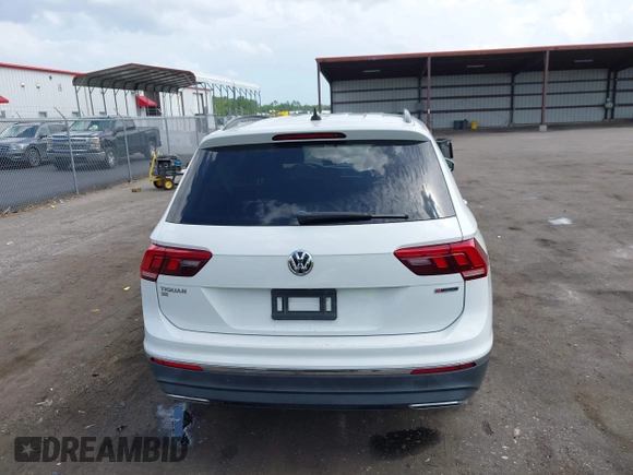 2021 Volkswagen Tiguan SE z VIN 3VV2B7AX5MM057743, wystawiony jako IAAI lot #42471192 z przebiegiem 80 133 mil mil oraz . Historia ofert i sprzedaży dostępna na DreamBid. Obrazek 16.