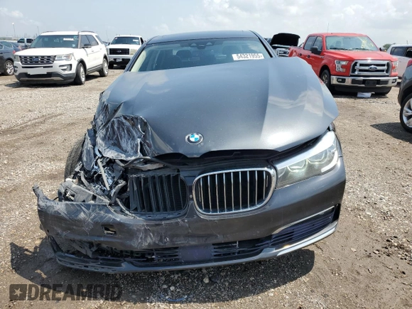 2016 BMW 7 Series 740i z VIN WBA7E2C57GG714564, wystawiony jako Copart lot #56186285 z przebiegiem 111 598 mil mil oraz Szkoda całkowita • Salvage title. Historia ofert i sprzedaży dostępna na DreamBid. Obrazek 5.