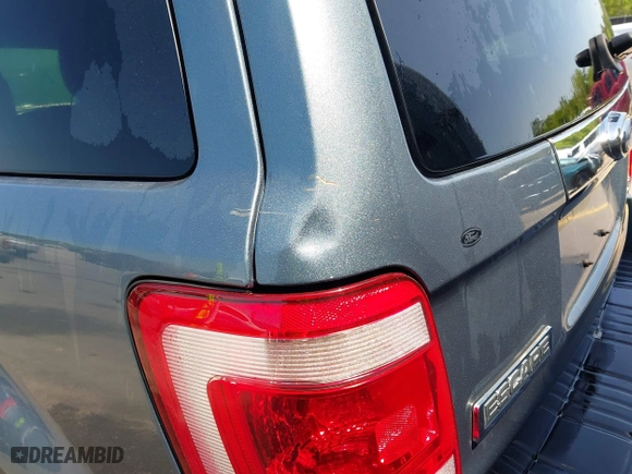 2011 Ford Escape Limited with VIN 1FMCU0EG0BKA61472, listed as a IAAI auction lot 41982614 with 291,808 mi miles. Bid and sale history available at carsss.com. Image 6.