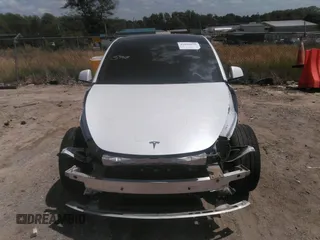 2022 Tesla Model Y Long Range z VIN 7SAYGDEE3NF385933, wystawiony jako IAAI lot #42059675 z przebiegiem 88 488 mil mil oraz . Historia ofert i sprzedaży dostępna na DreamBid. Obrazek 11.