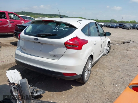 2016 Ford Focus Titanium with VIN 1FADP3N28GL222941, listed as a IAAI auction lot 42050881 with 97,001 mi miles and . Bid and sale history available at DreamBid. Image 4.