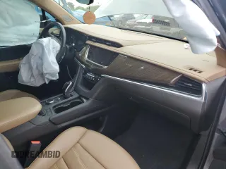 2021 Cadillac XT6 AWD Sport z VIN 1GYKPHRS9MZ165189, wystawiony jako Copart lot #58482665 z przebiegiem Nie podano mil oraz Szkoda całkowita • Salvage title. Historia ofert i sprzedaży dostępna na DreamBid. Obrazek 8.