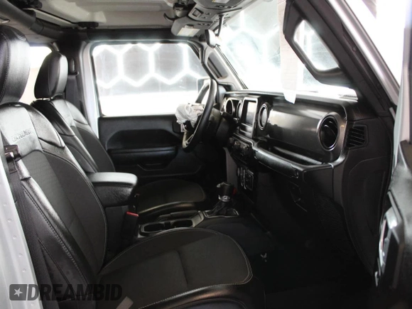 2023 Jeep Gladiator Freedom с VIN 1C6HJTAGXPL518694, выставлен на аукционе Copart как лот 54447635 с пробегом 9 460 миль миль и Списание • Salvage title. История ставок и продаж доступна на DreamBid. Изображение 5.