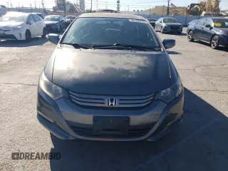 2010 Honda Insight EX with VIN JHMZE2H73AS039935, listed as a Copart auction lot 46192575 with 127,329 mi miles and Salvage Title. Bid and sale history available at DreamBid. Image 5.
