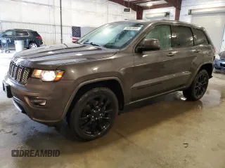 2018 Jeep Grand Cherokee Altitude with VIN 1C4RJFAG2JC220615, listed as a Copart auction lot 56965855 with 113,284 mi miles and Salvage title. Bid and sale history available at DreamBid. Image 1.