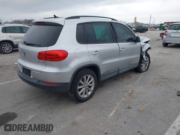 2015 Volkswagen Tiguan SE with VIN WVGAV7AX5FW592216, listed as a IAAI auction lot 41401020 with 110,726 mi miles and . Bid and sale history available at DreamBid. Image 4.