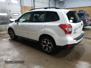 2014 Subaru Forester XT Touring with VIN JF2SJGMCXEH556507, listed as a Copart auction lot 56584515 with 145,113 mi miles and Clean title. Bid and sale history available at DreamBid. Image 2.