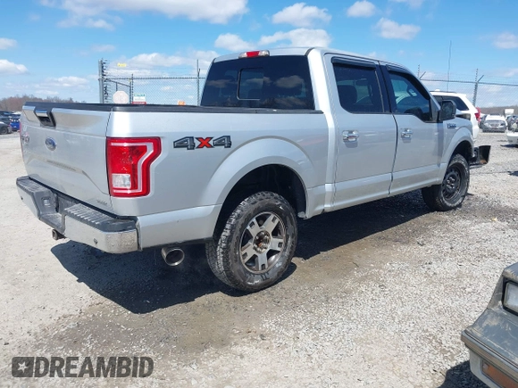 2015 Ford F-150 XLT with VIN 1FTEW1EF2FFC28742, listed as a IAAI auction lot 41983342 with 127,341 mi miles and . Bid and sale history available at DreamBid. Image 4.