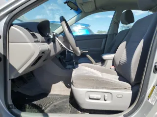 2005 Toyota Camry STD z VIN 4T1BE32K55U410458, wystawiony jako Copart lot #61082745 z przebiegiem 242 261 mil mil oraz Szkoda całkowita • Salvage title. Historia ofert i sprzedaży dostępna na DreamBid. Obrazek 7.