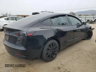 2021 Tesla Model 3 Standard Range Plus with VIN 5YJ3E1EA6MF877752, listed as a Copart auction lot 44776425 with Not Provided miles and Salvage Title. Bid and sale history available at DreamBid. Image 3.