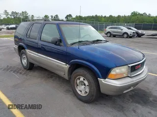 1999 GMC Jimmy SLE z VIN 1GKCS13W6X2500762, wystawiony jako IAAI lot #42197783 z przebiegiem 238 250 mil mil oraz . Historia ofert i sprzedaży dostępna na DreamBid. Obrazek 1.
